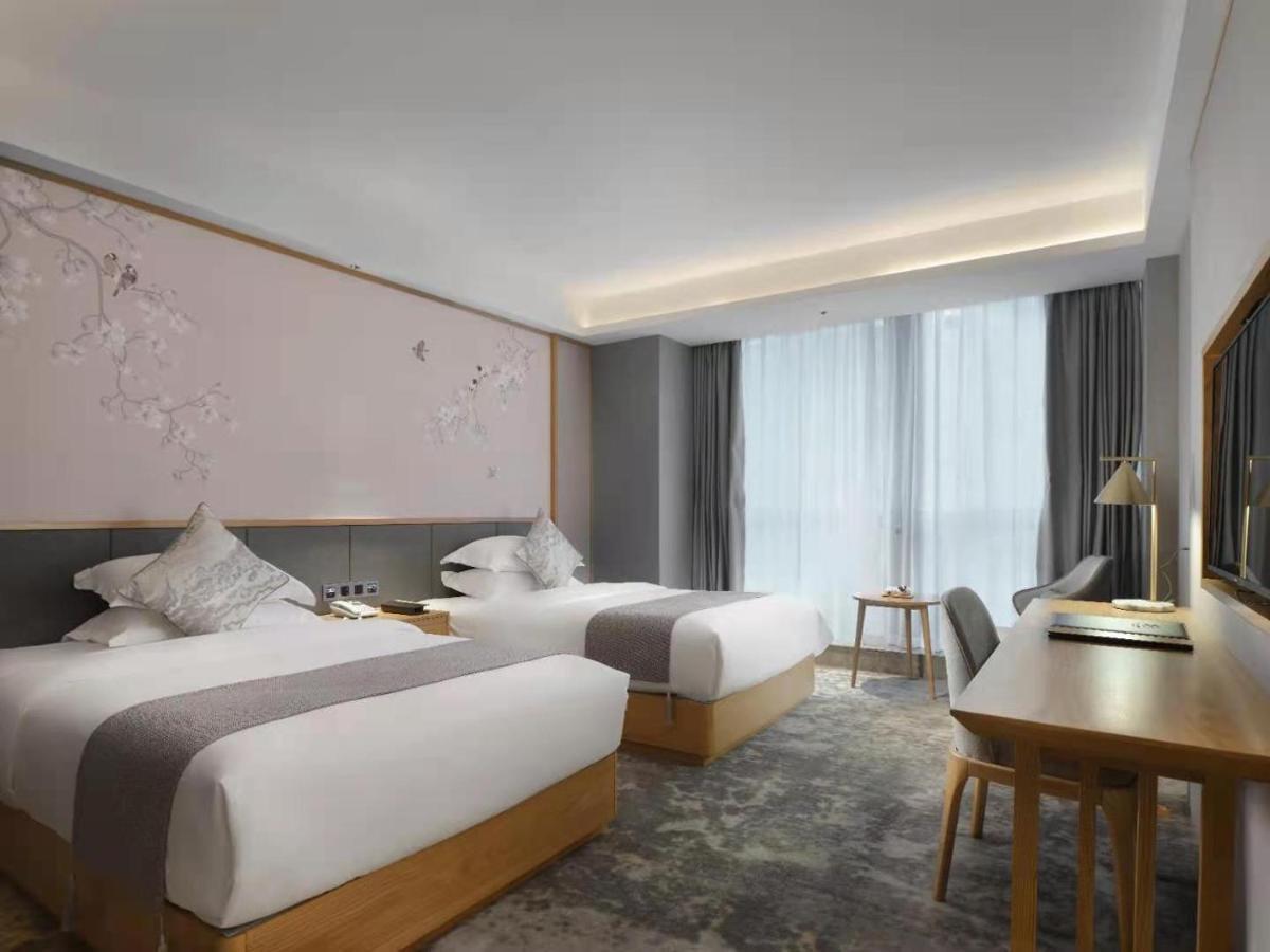 Baian Art Hotel Luzhou Esterno foto