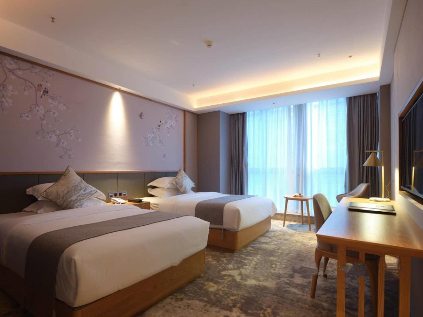 Baian Art Hotel Luzhou Esterno foto