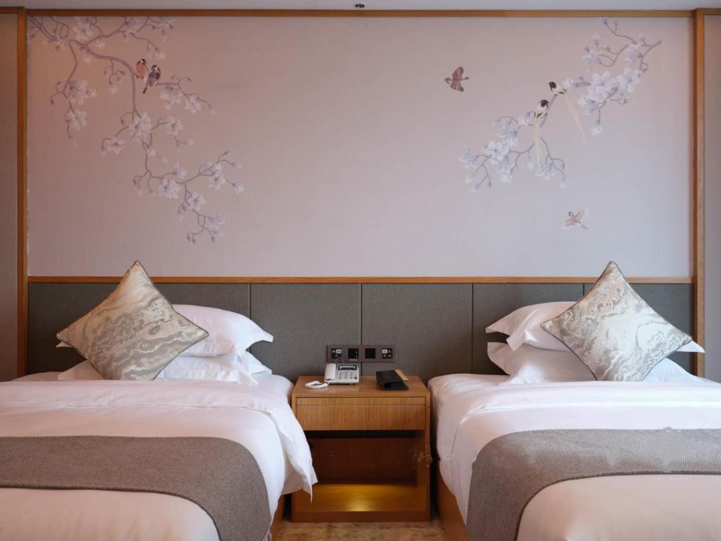 Baian Art Hotel Luzhou Esterno foto