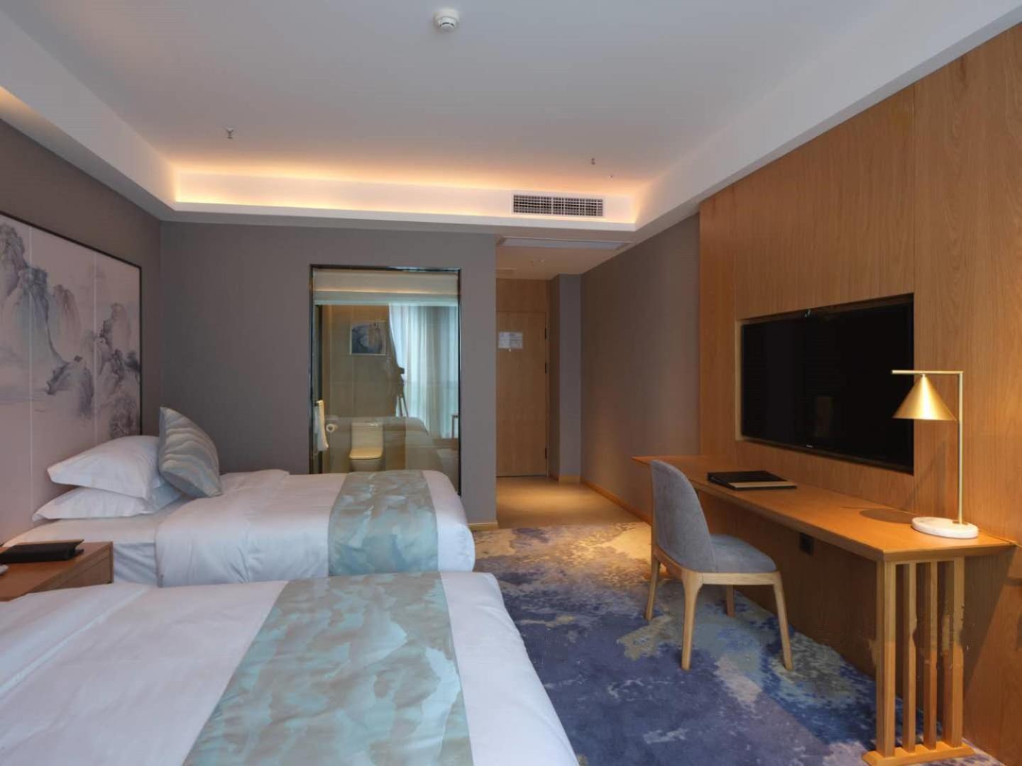 Baian Art Hotel Luzhou Esterno foto