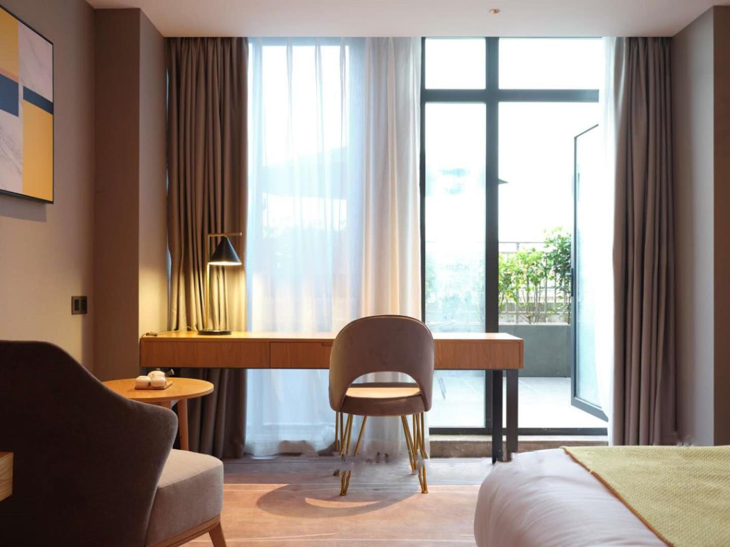 Baian Art Hotel Luzhou Esterno foto